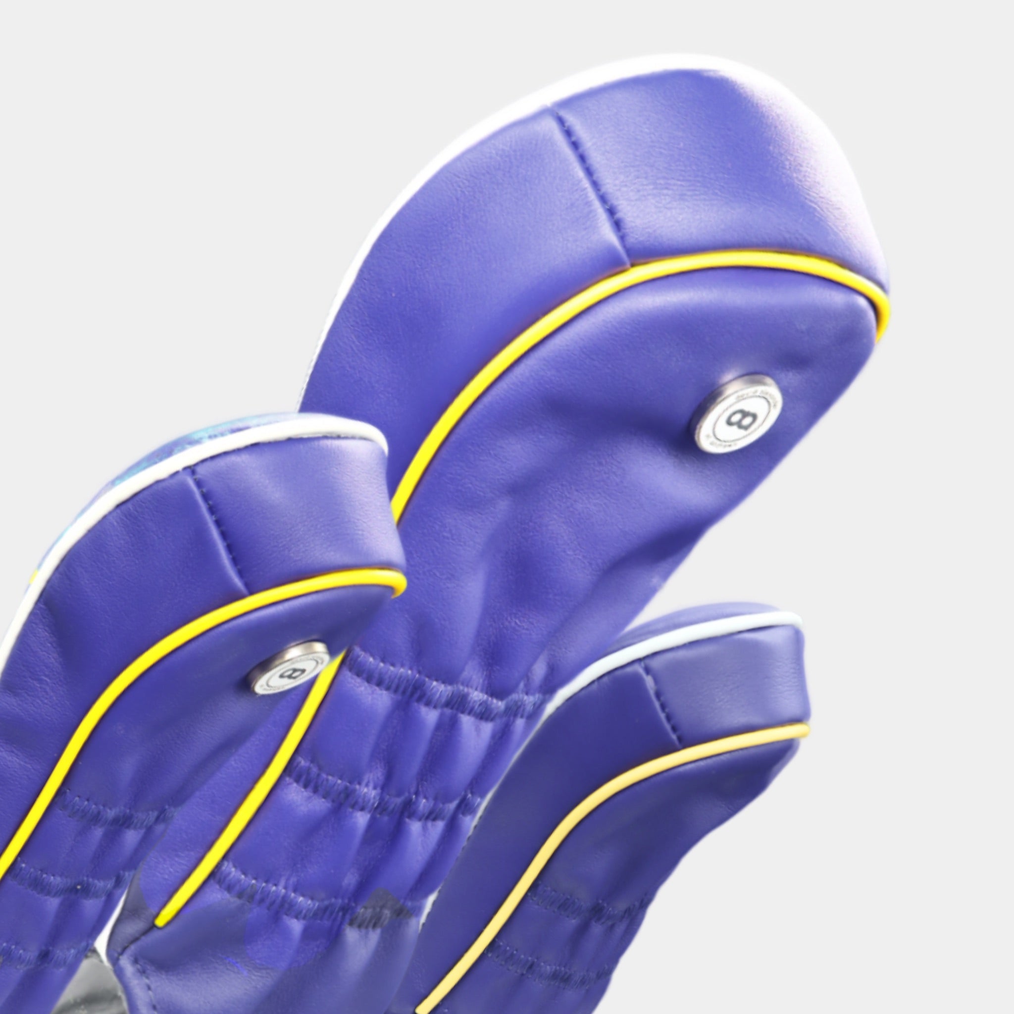 A set of blue European leather golf club headcovers with by Dave Alexander