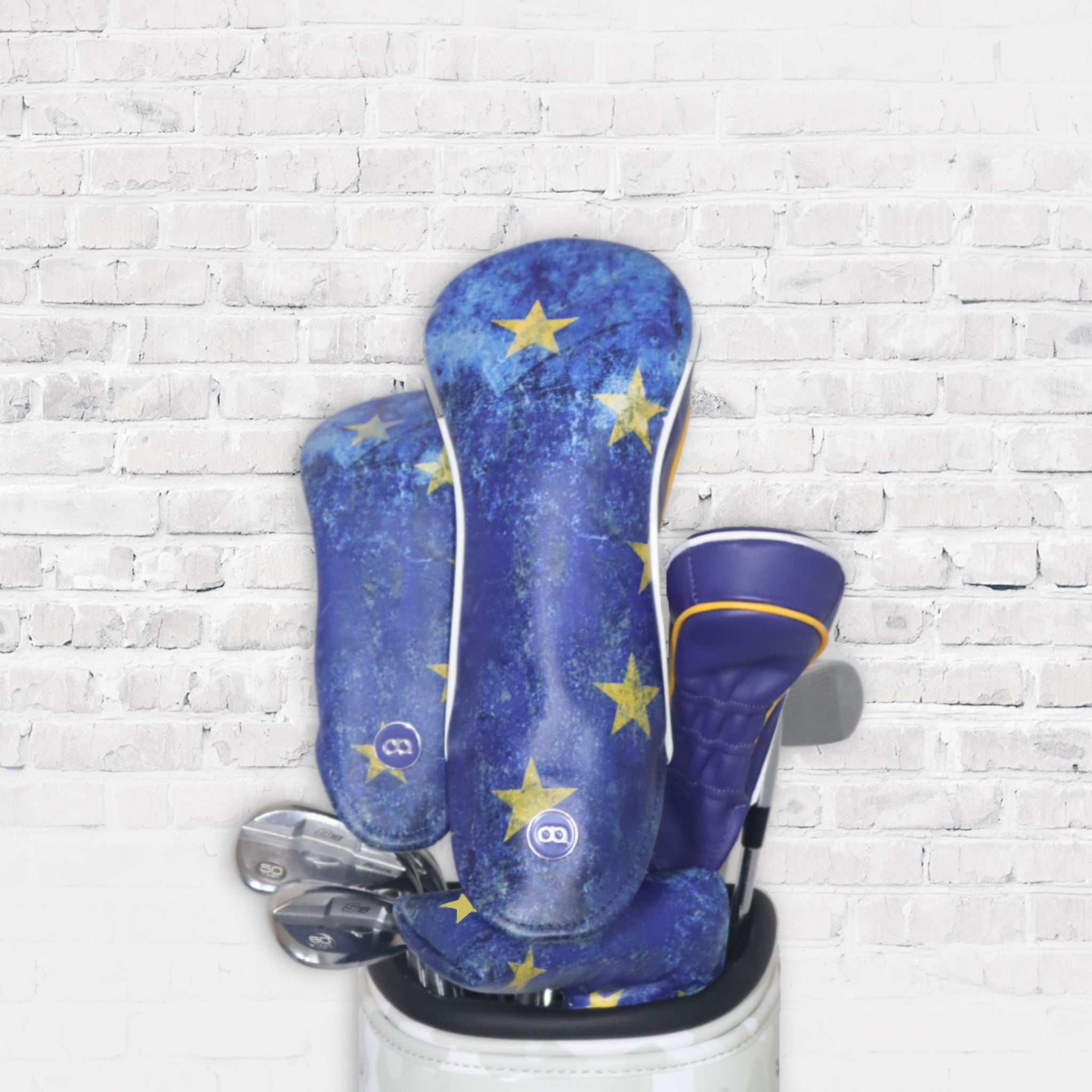 A set of blue European leather golf club headcovers with by Dave Alexander