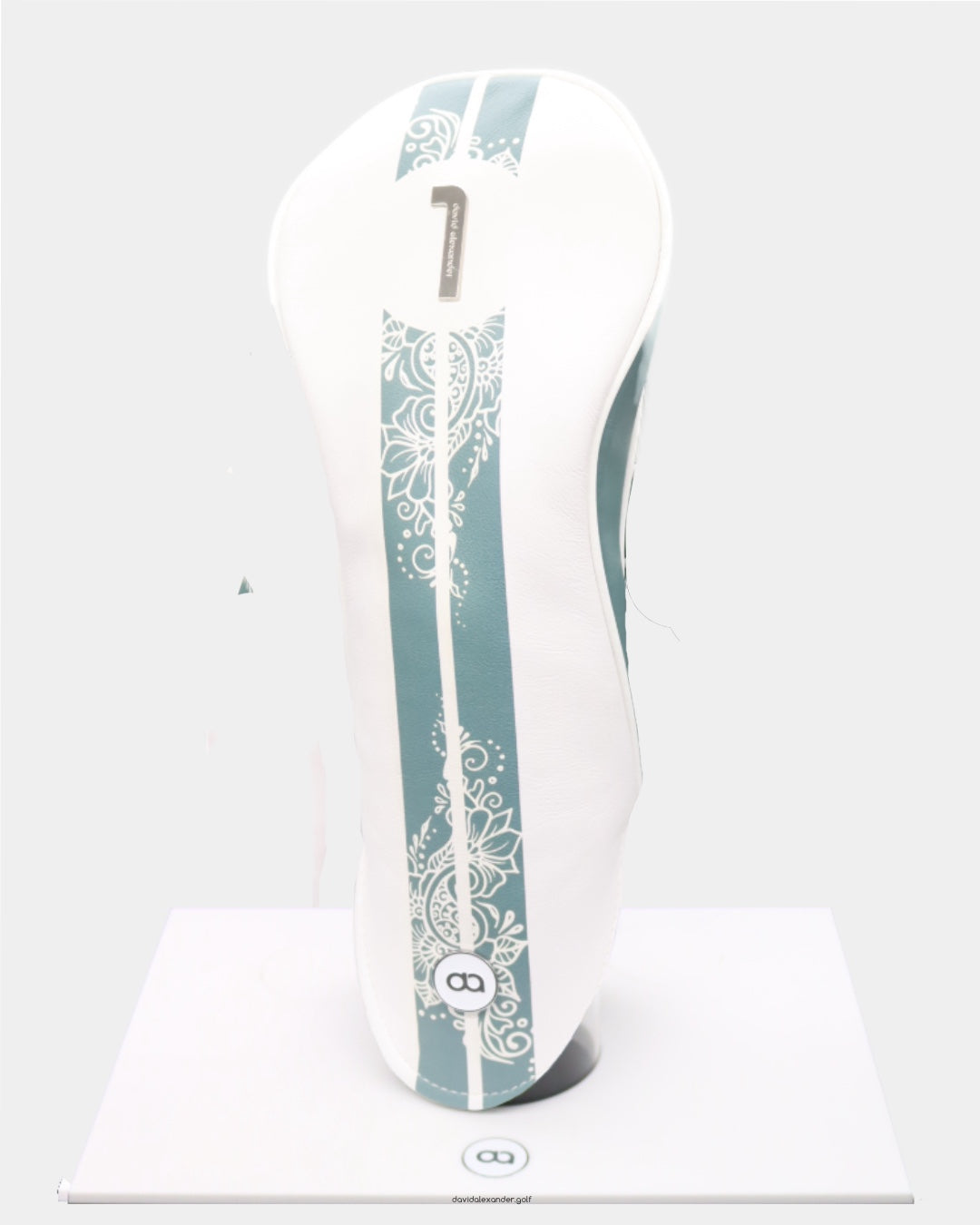 White and teal green henna leather headcover by David Alexander.