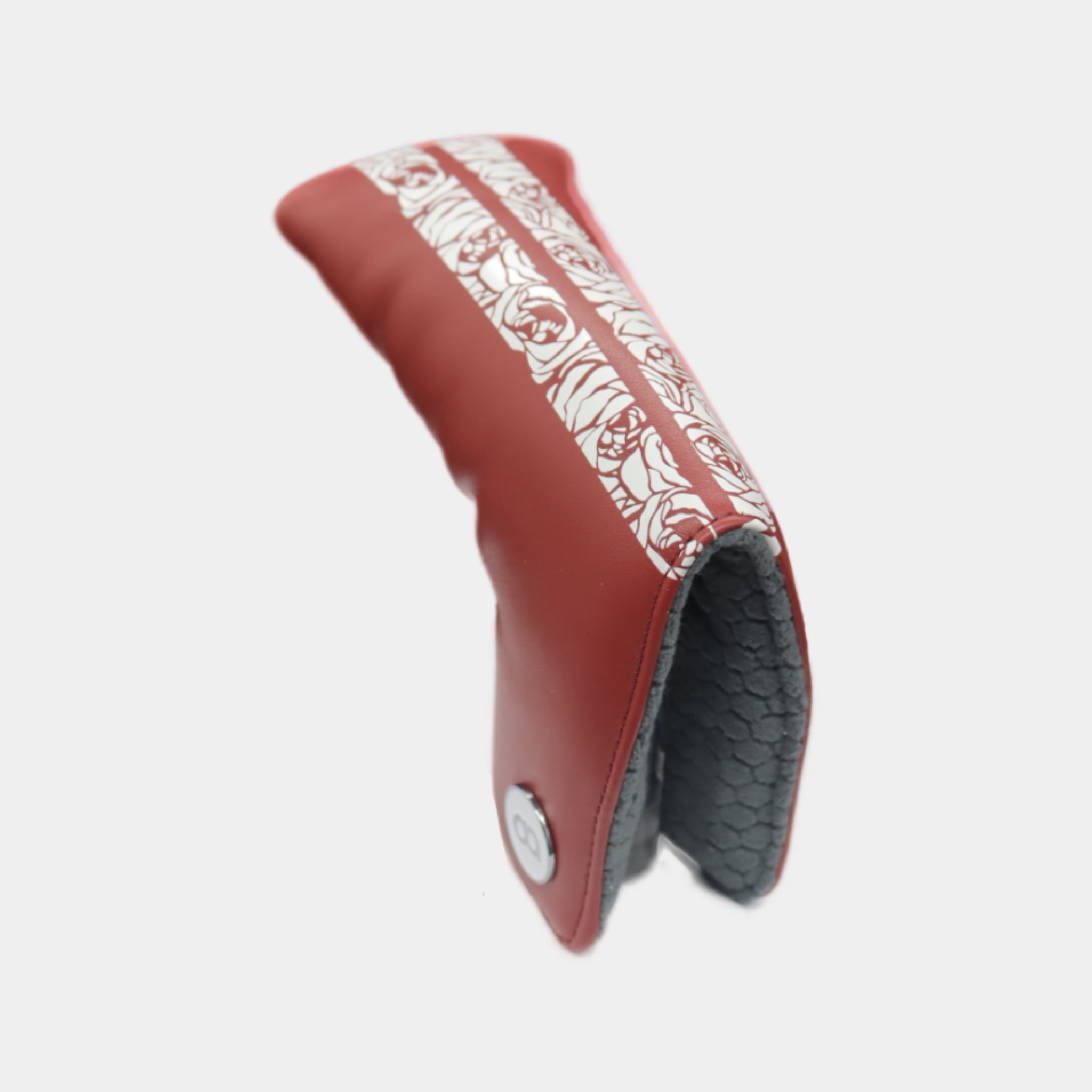 Red golf club head cover with white rose pattern by David Alexander