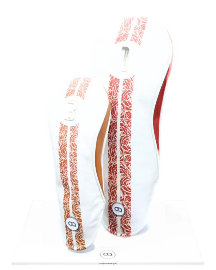 White and bronze leather fairway head cover with rose design and chrome number.