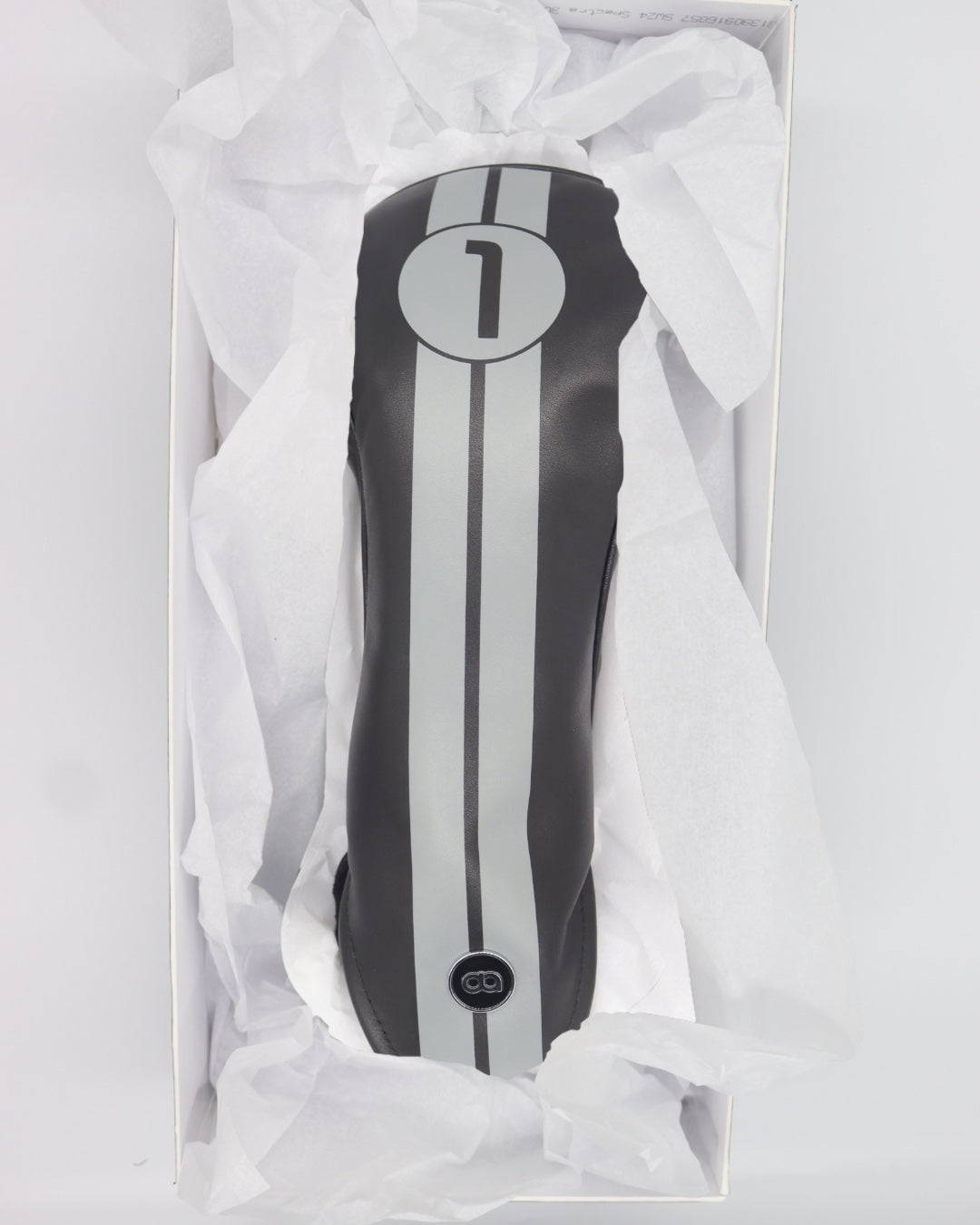 Black racing line leather golf club headcover in a gift box. David Alexander Golf