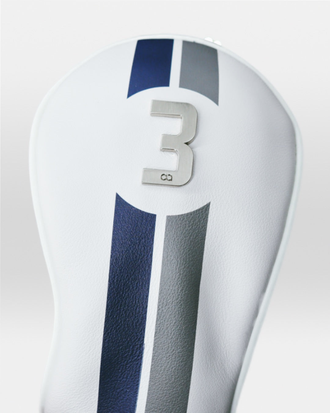 metal number three on white and navy blue leather david alexander-designed headcover