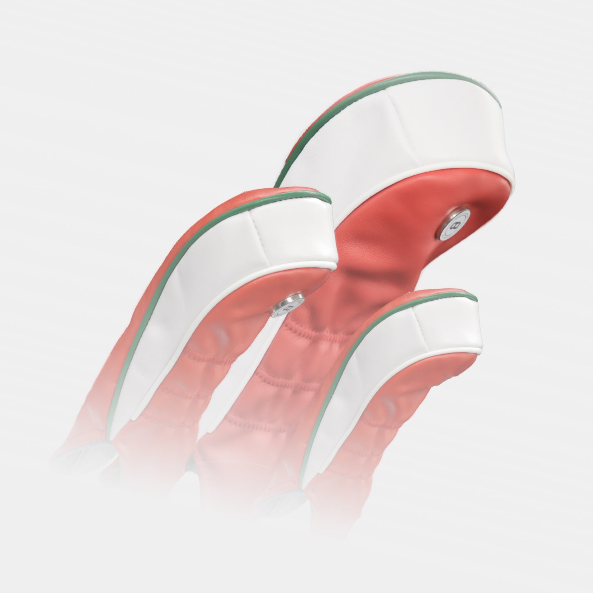 A set of Wales red, white and green leather headcovers with chrome dragon by David Alexander