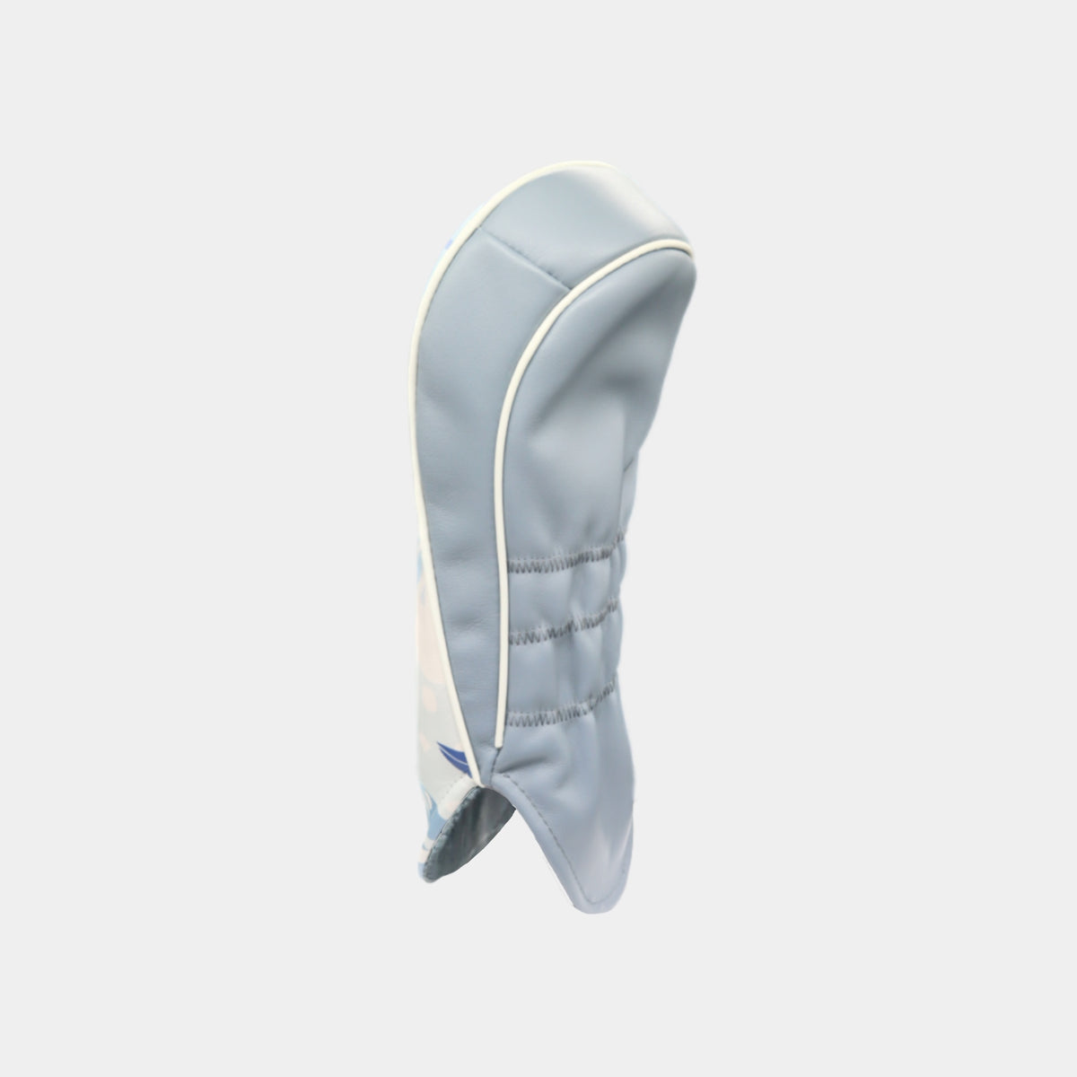 The back of a winter-themed leather golf club headcover in shades of light blue, gray, and white, shown against a light gray background.