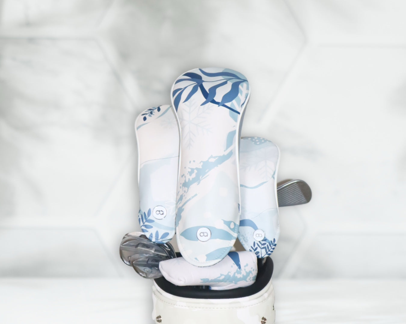 Set of white and greay leather golf club headcovers for women. David Alexander Winter Collection