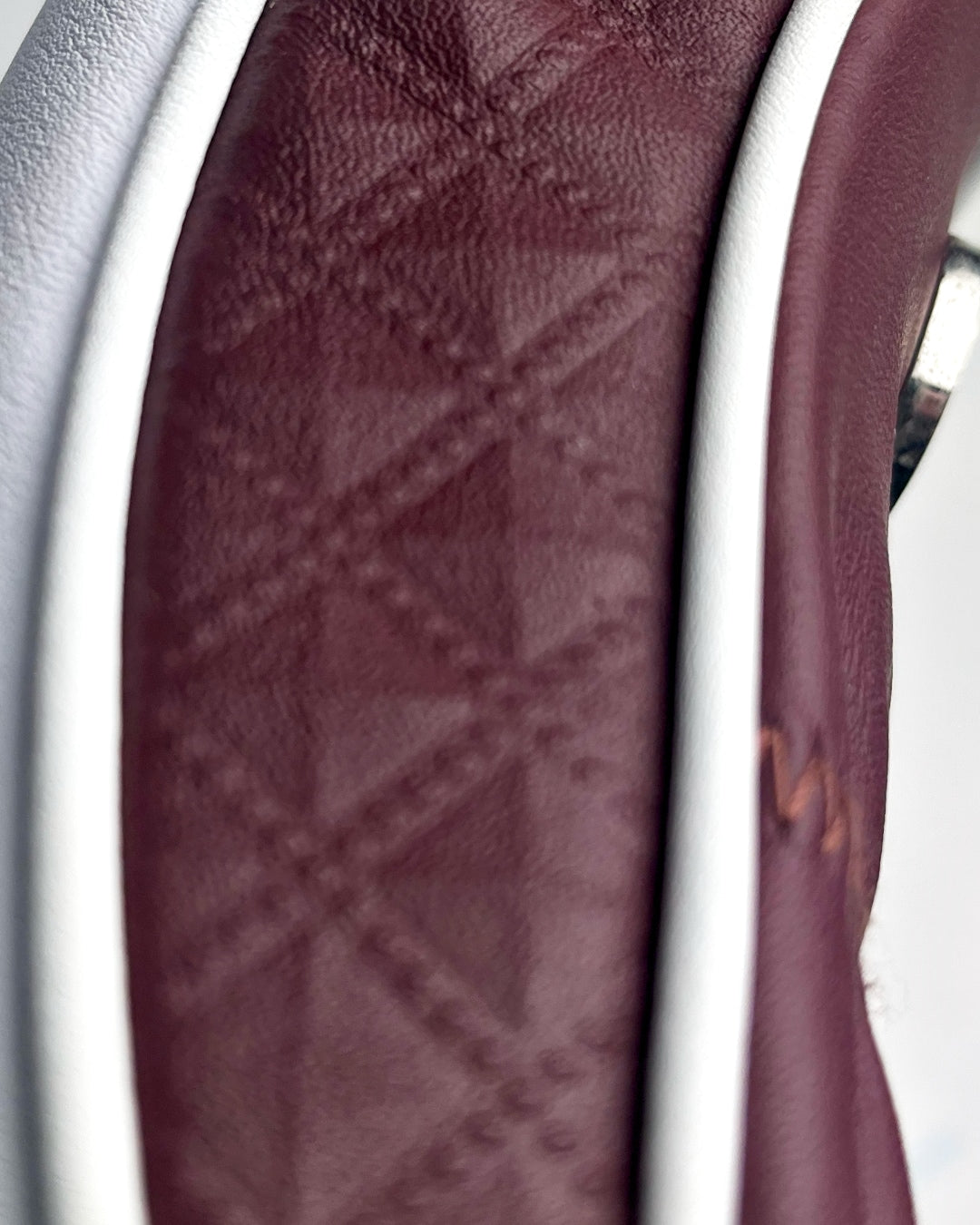 Diamond side emboss from white and burgundy leather fairway wood headcover by David Alexander