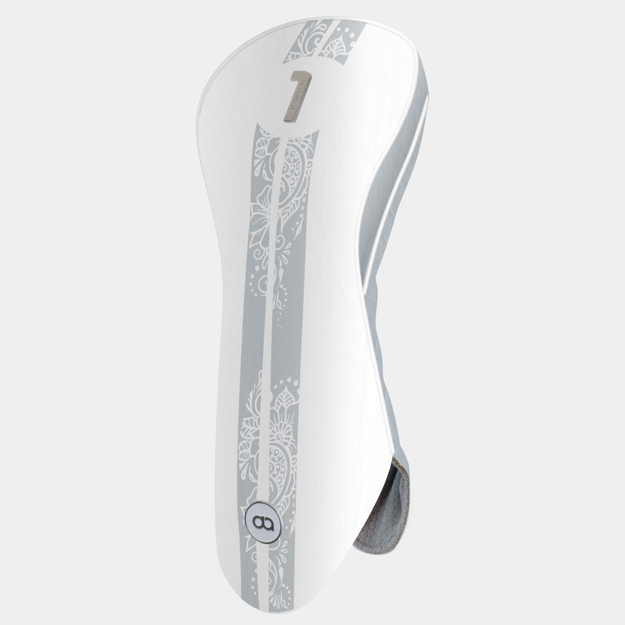 A white golf club headcover with a vertical gray decorative stripe featuring a henna pattern, a metal number 1.
