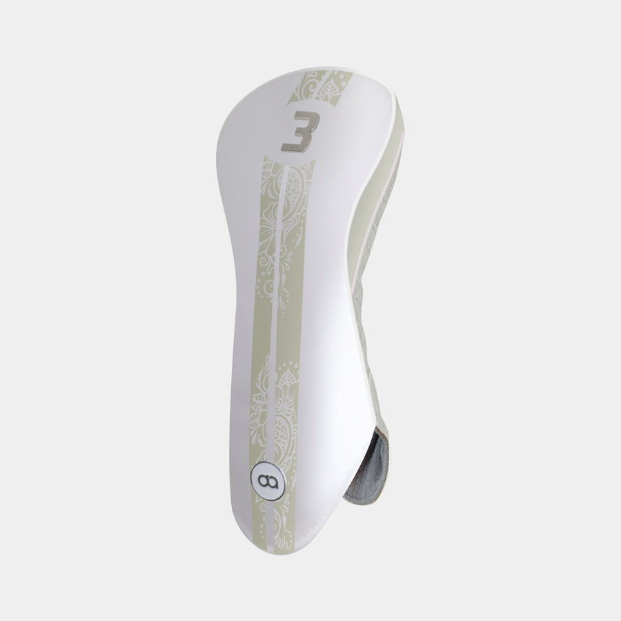 A white leather fairway golf club headcover with beige sides and back and a beige stripe with a henna floral display. Shown on a grey background.