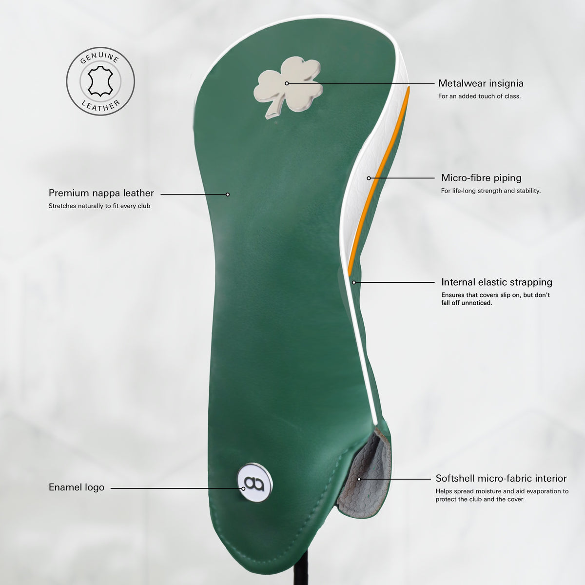 A green Ireland golf club headcover with a chrome shamrock logo near the top and a white circular logo near the bottom. Featuring a white side with orange and white pipping.