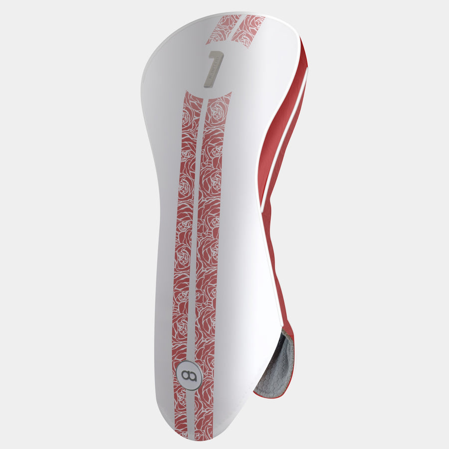 A golf club headcover in white with a vertical crimson red rose pattern stripe, a metal number 1 on the upper section.