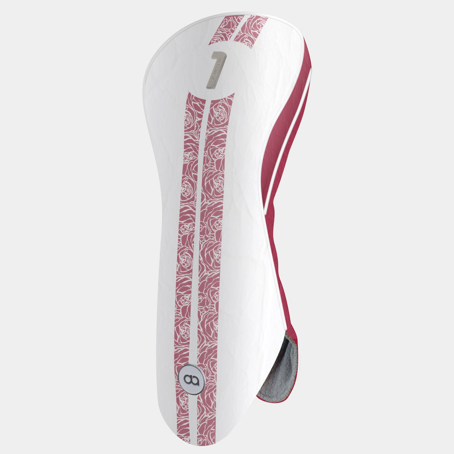 A golf club headcover in white with a vertical crimson red  rose pattern stripe, a metal number 1 on the upper section.