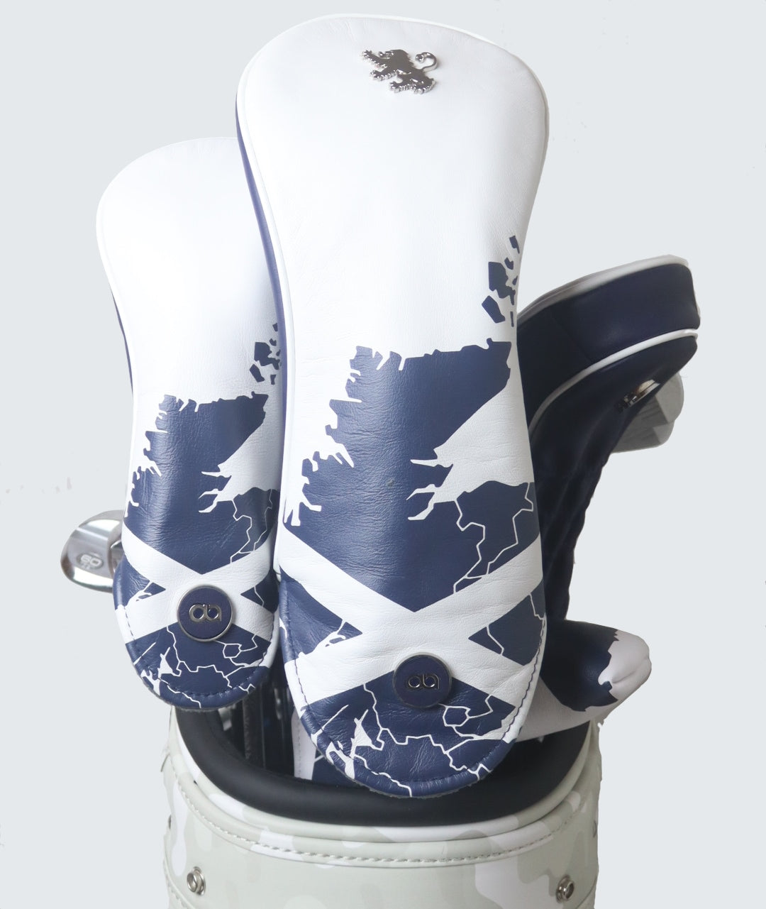 Sett of Scotland white and navy blue leather headcovers by David Alexander