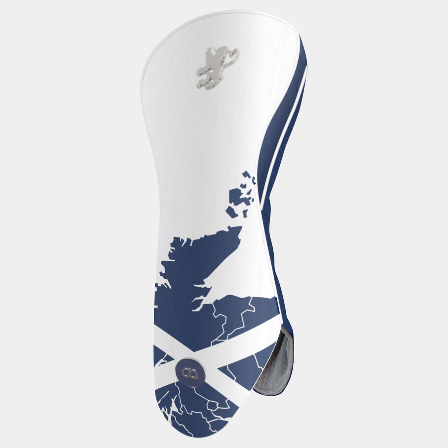 A white and navy blue golf club headcover featuring a map of Scotland, the Scottish flag, and a silver lion logo, shown on a light gray background.