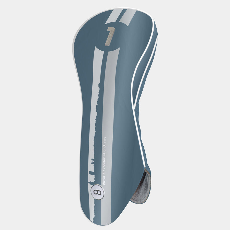 St. Andrews edition madeira blue leather golf club headcover with a bold white and grey racing stripe design, featuring a metal club identifier.