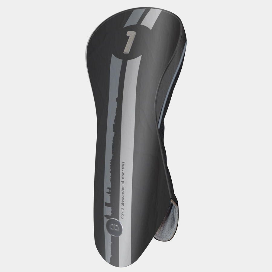 St. Andrews edition black leather golf club headcover with a bold silver and grey racing stripe design, featuring a metal club identifier